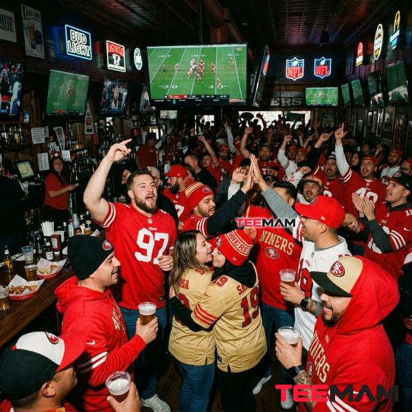 San Francisco 49ers Fans Watching Game At Sports Bar
